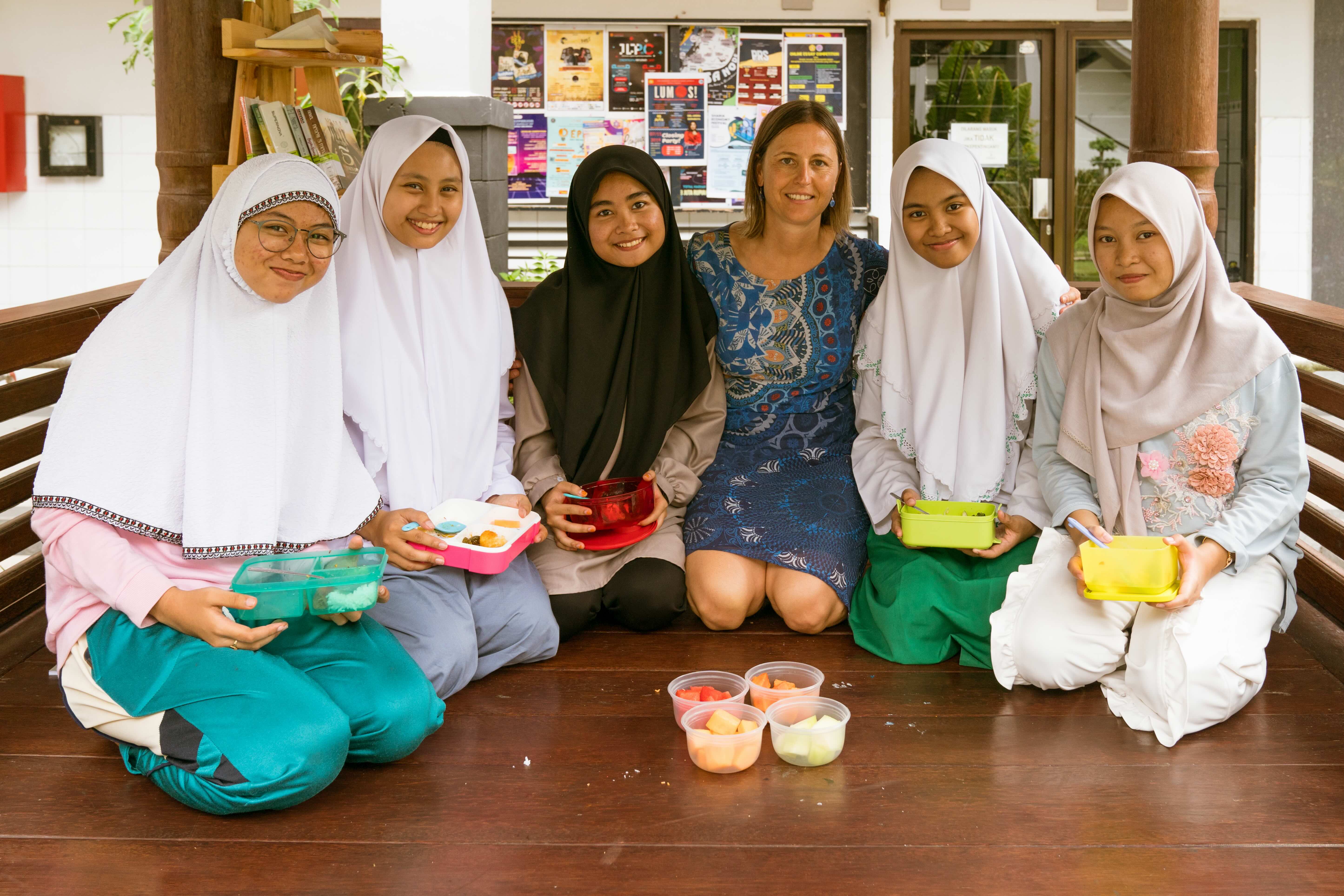 A woman with school-going girls