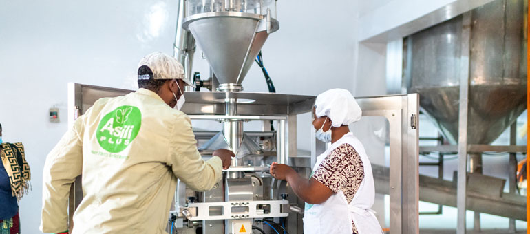 Workers fortifying flour in Kenya