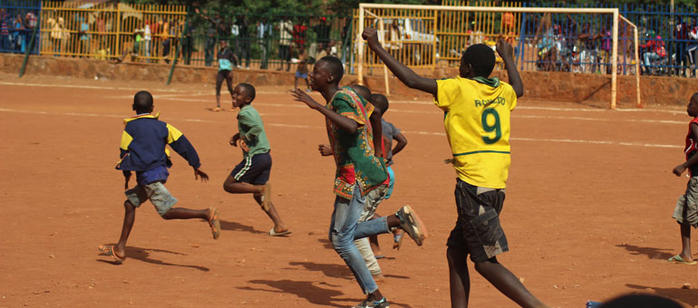 Children playing football in Africa