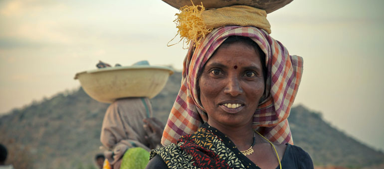 Woman in India looking at the camera and smiling