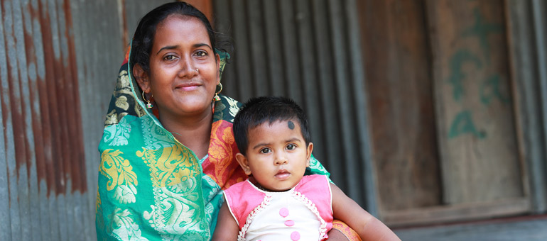 Mother with daughter smiling 