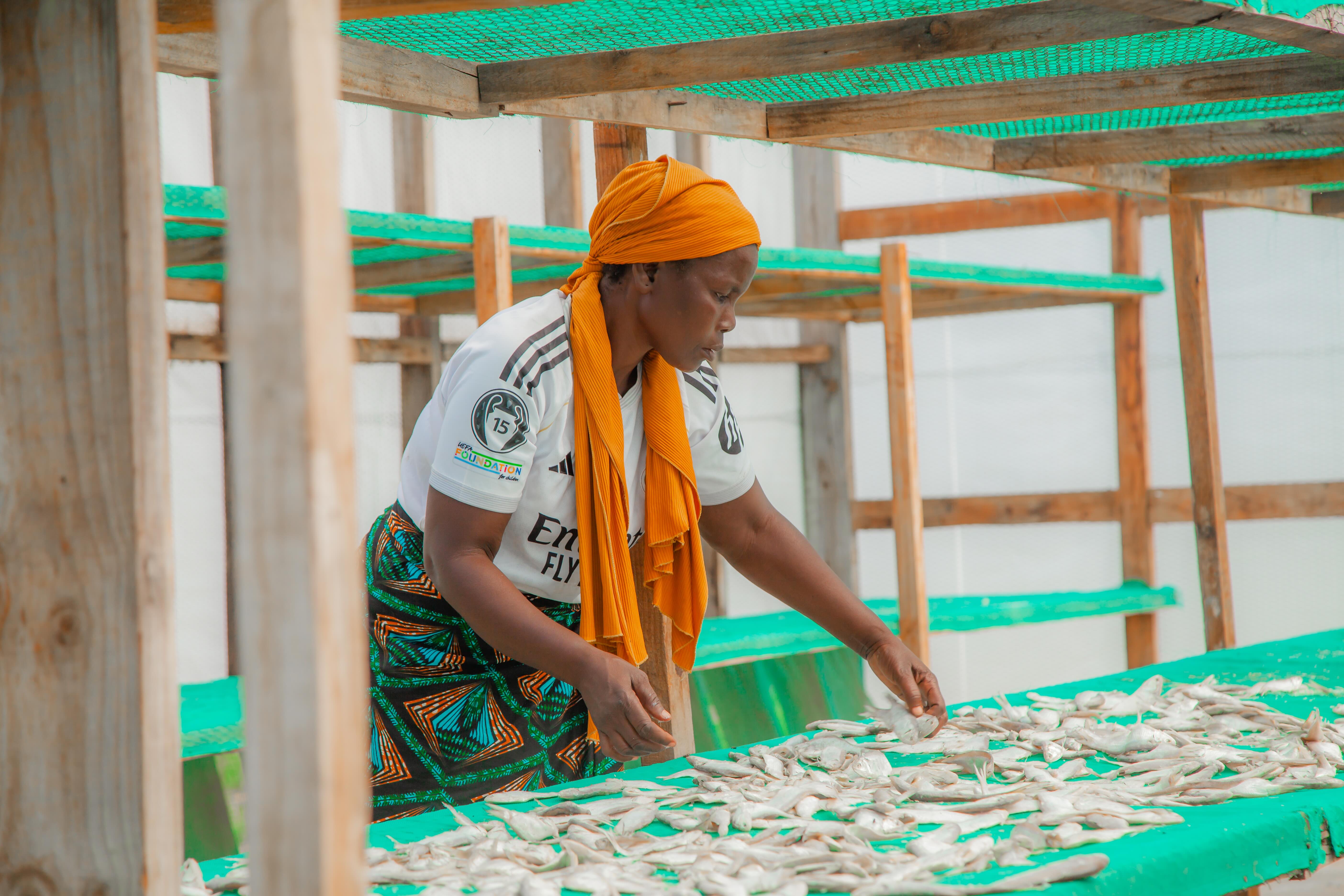 Isabel Alfândega and cleaner dried fish in Mozambique