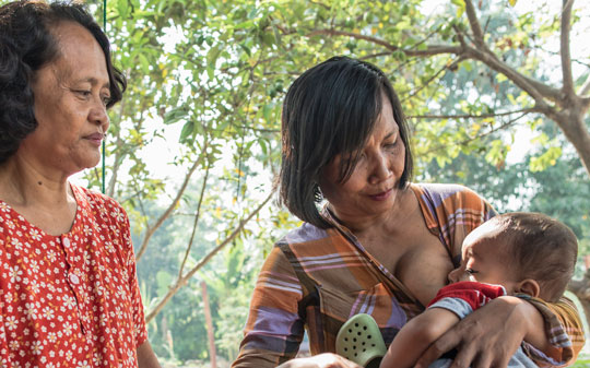 Indonesian woman breastfeeding