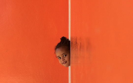 kid and orange wallpaper