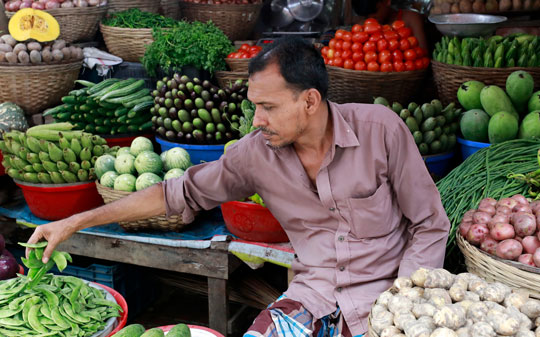 Man at the market in Bangladesh