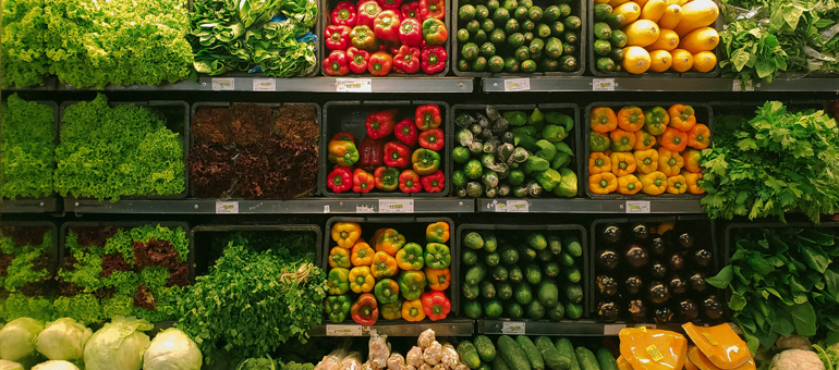 fruits and vegetables on a shelf display