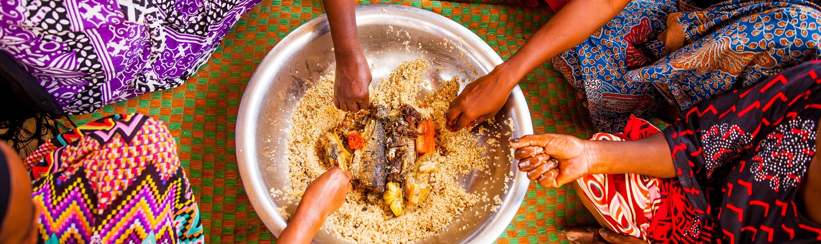 Indian ladies eating rice