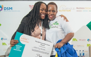 Two women hug and share the BOP Innovation Centre prize
