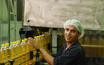 Worker in oil fortification refinery