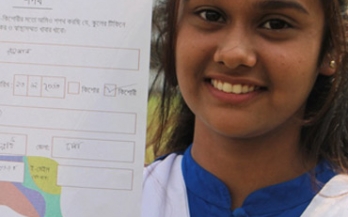 Girl holding a pledge Girl holding a pledge