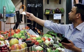 Man paying at a supermarket