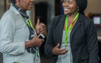 Women talking during a conference