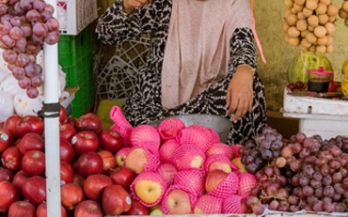 Woman showing her thumb up in Indonesia Woman showing her thumb up in Indonesia