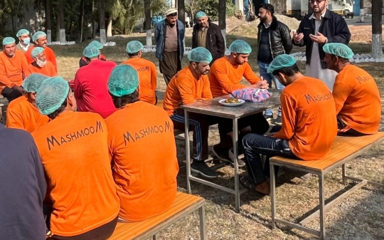 young men at work sitting