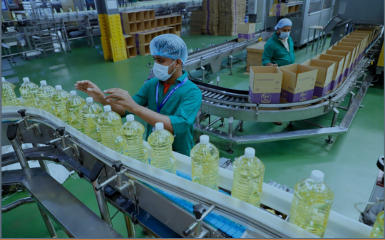 A man working in an edible oil factory
