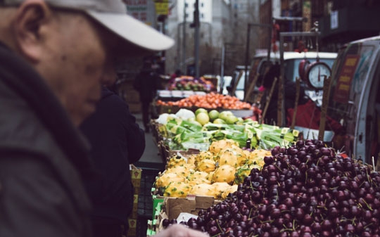 Man buying fresh fruits from the roadside