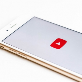 I-phone with YouTube icon I-phone with youtube icon