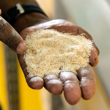 Man pointing his finger to processed flour