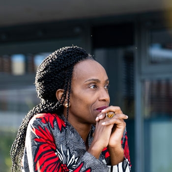 Prisca looking ahead and lost in her thoughts Prisca looking ahead and lost in her thoughts